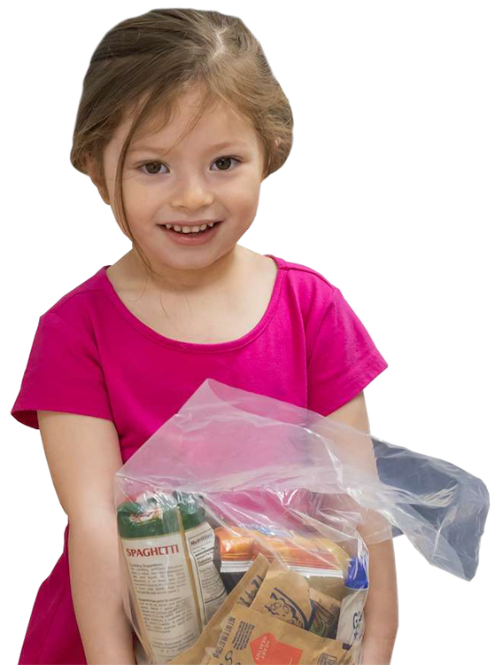 Young girl holding a bag of food